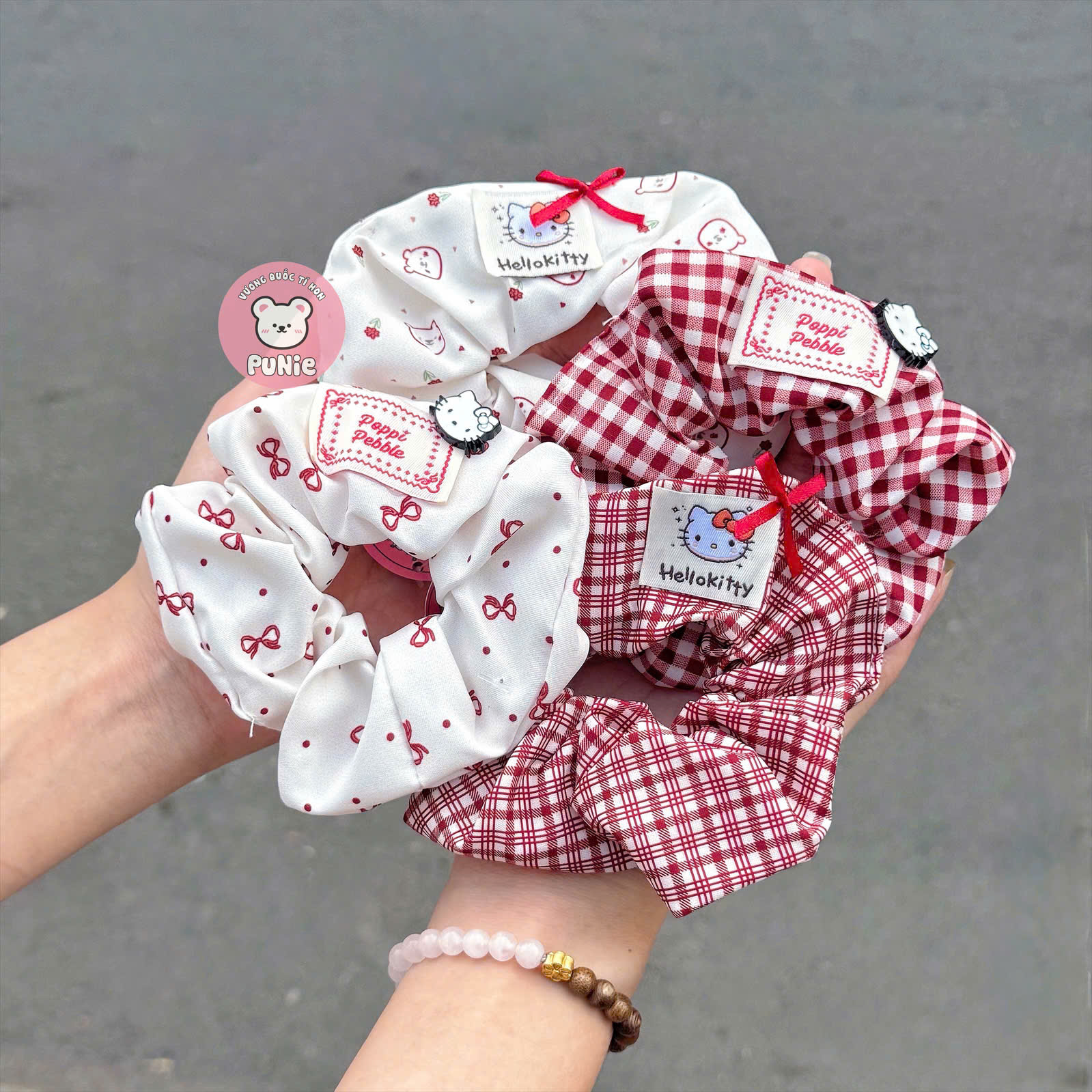 CỘT VẢI TRẮNG CARO KITTY ĐỎ